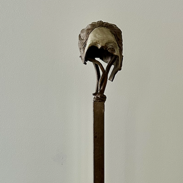 FRAGMENT: FACE ON STAND