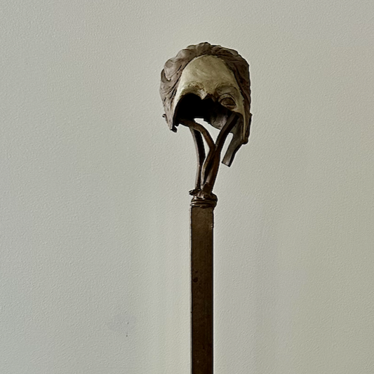 FRAGMENT: FACE ON STAND